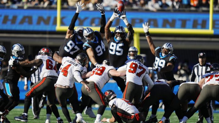 Bucs clinch NFC South 9-0 over Panthers
