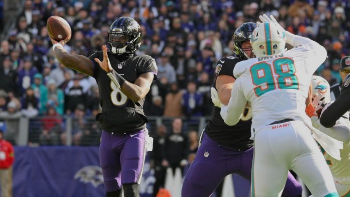 Ravens thrash Dolphins to clinch #1 seed