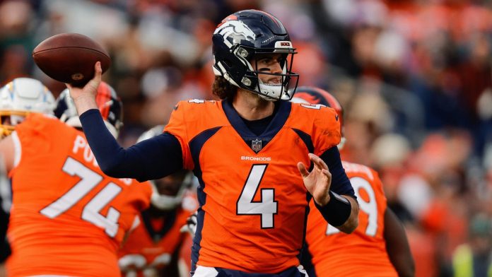 Passive Broncos won't make move from 12 for QB